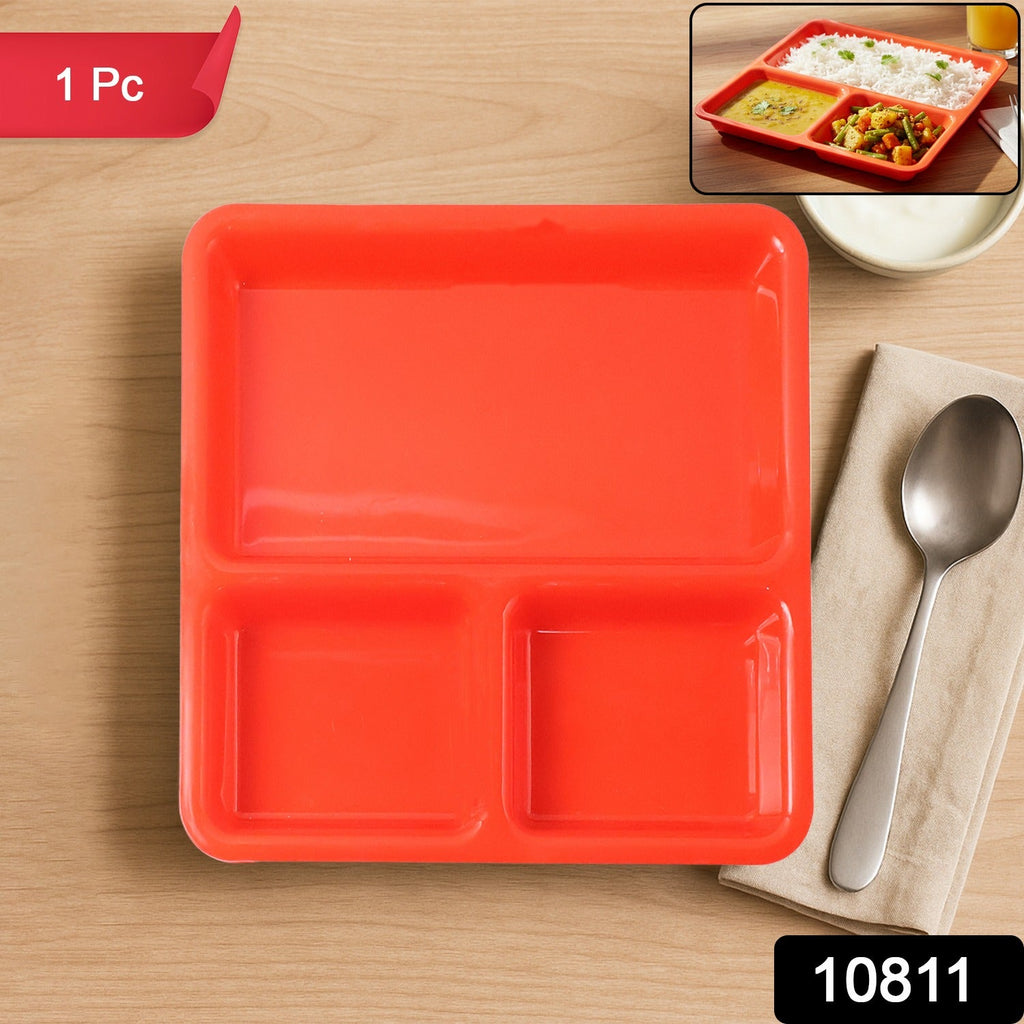 Plastic 3-compartment meal tray from an overhead view.