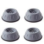 Four washer dryer vibration pads placed on floor surface