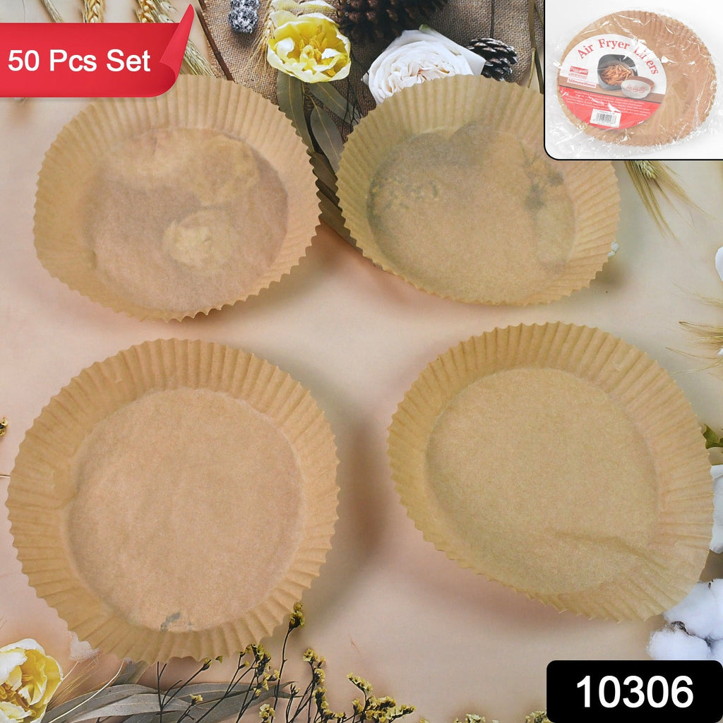 A single round air fryer liner made from non-stick parchment paper in an air fryer basket.