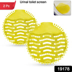 Fragrant urinal screen mat emitting fresh citrus scent for long-lasting washroom freshness.