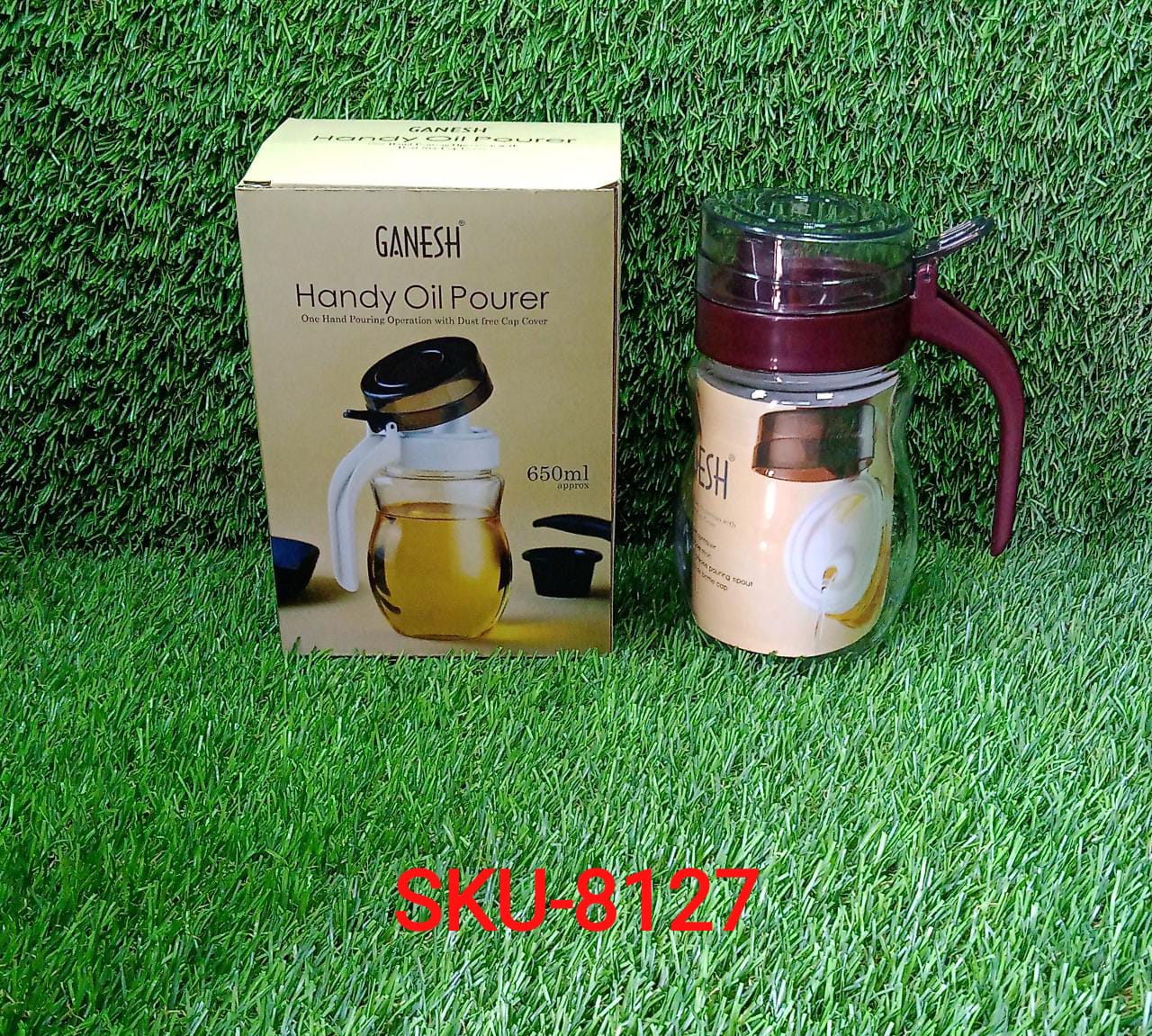 Plastic oil container with a small nozzle for controlled flow.