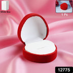 Open velvet ring box showing smooth white cushioned interior holding ring securely