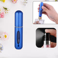 Sleek 5ml refillable perfume bottle in silver, perfect for travel.