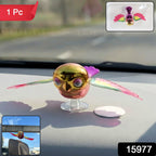 Colorful bird dashboard decoration adding lively look to vehicle interior