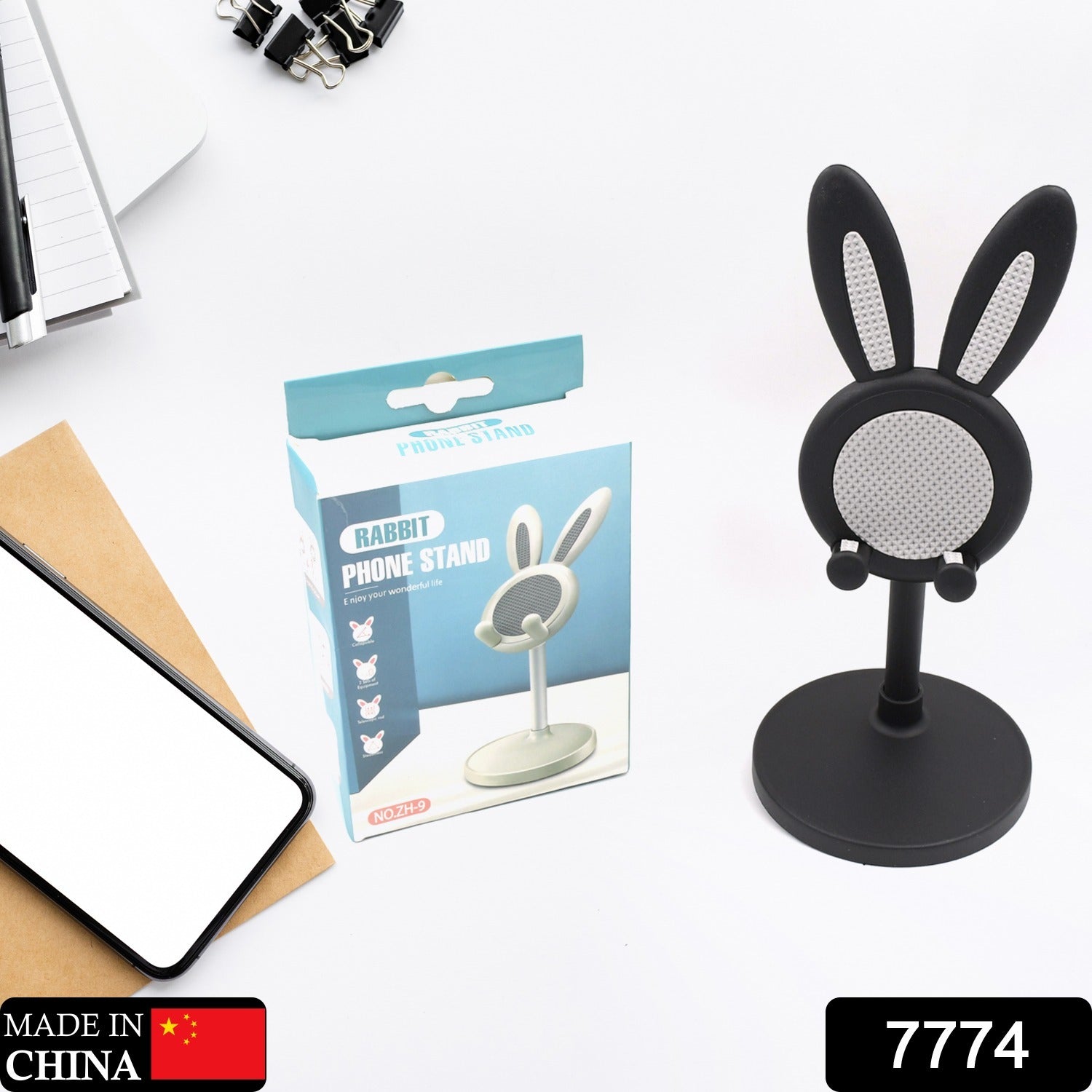 Kawaii Bunny Phone Stand holding a smartphone, ideal as a desk accessory.