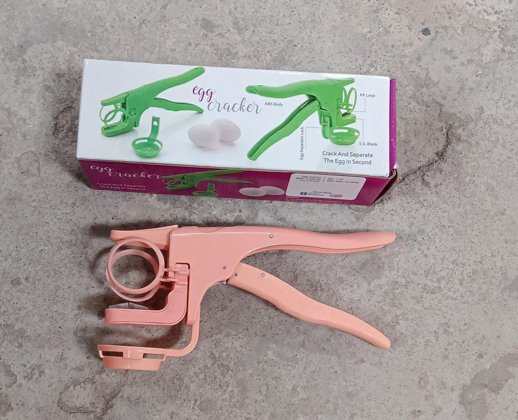 Durable handheld egg cracker with its efficient separator, making egg preparation simple.