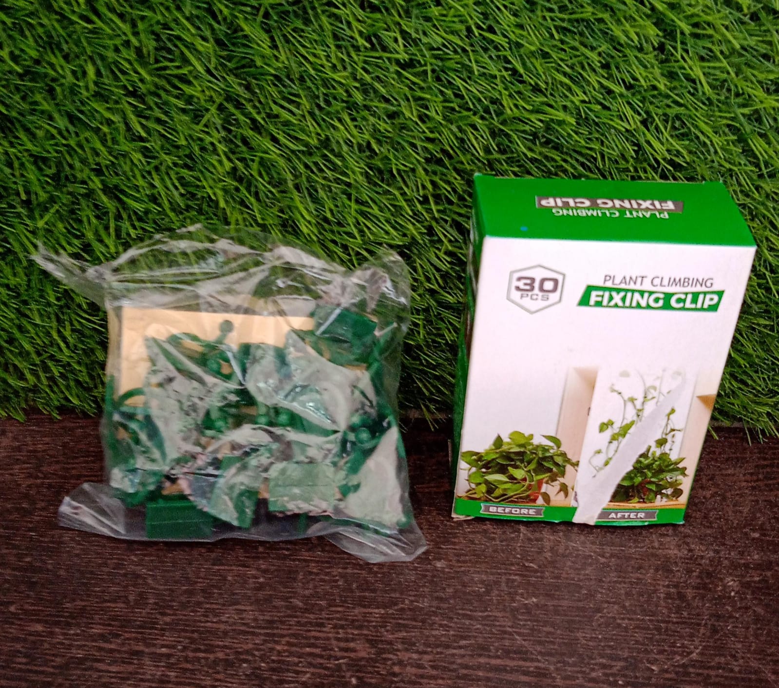Overview of the 30-piece set of versatile wall plant clips for plant and cable management.