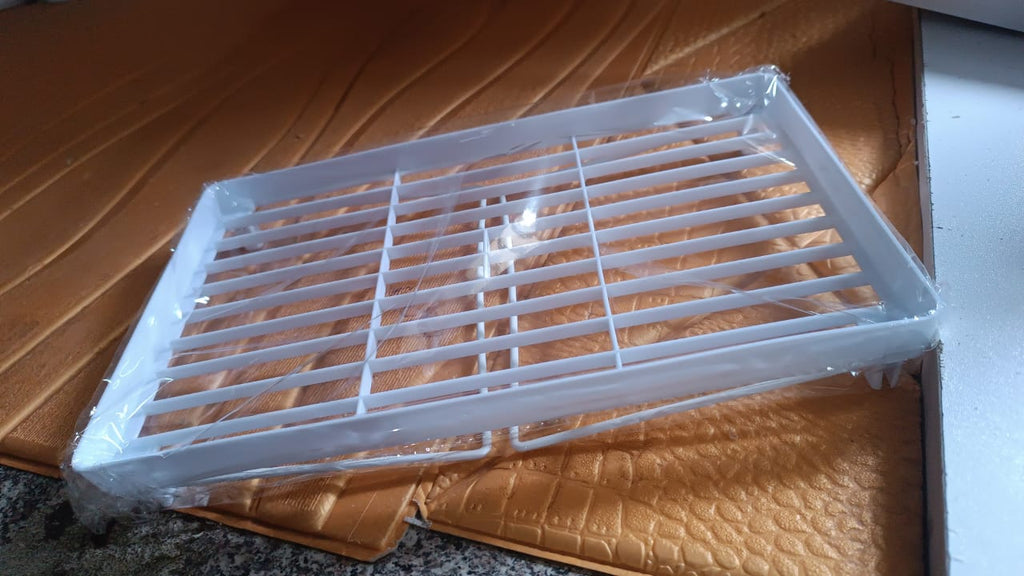 Versatile plastic storage rack for kitchen and bathroom essentials