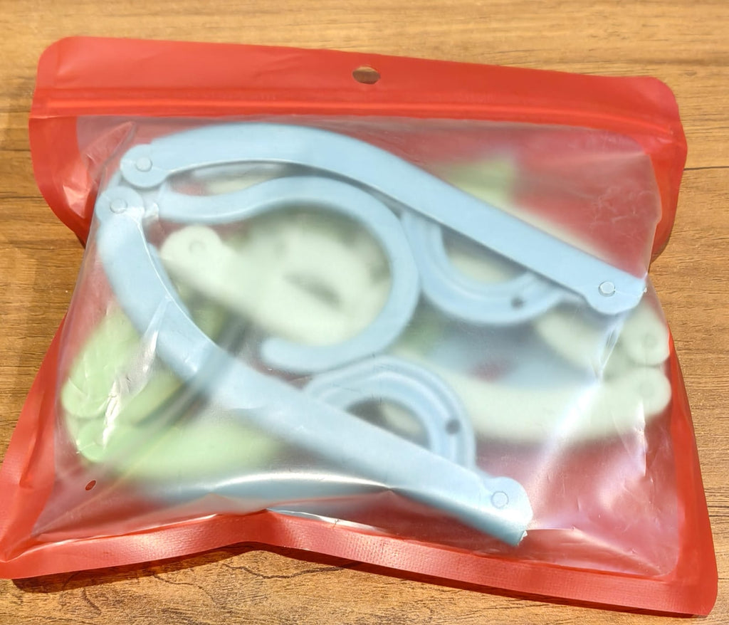 Portable folding clothes hanger ideal for travel and home organization