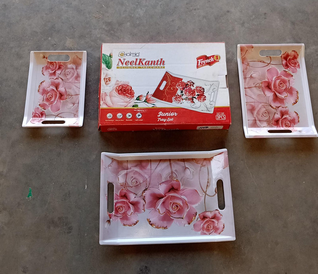 Complete 3-piece plastic serving tray set with a decorative pattern, neatly stacked.
