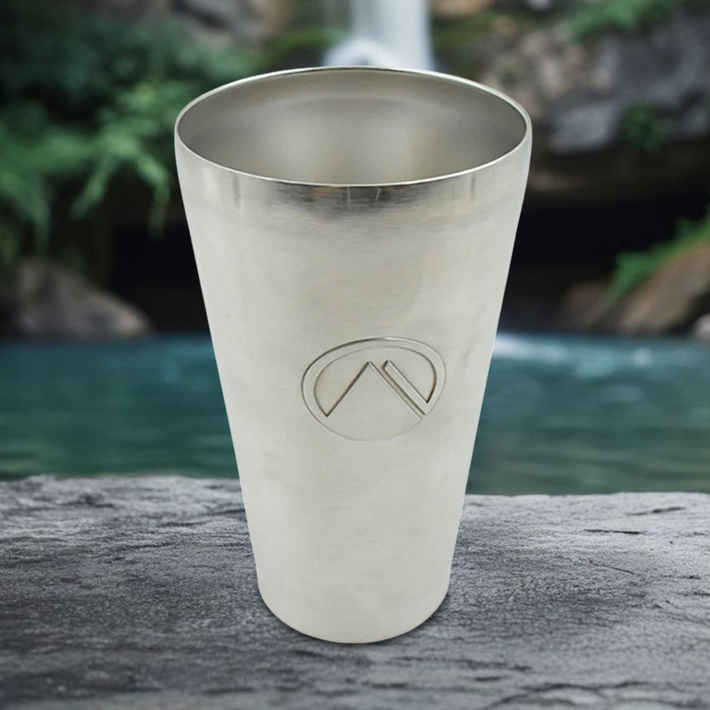 Front view of a sleek stainless steel travel mug, perfect for on-the-go hydration.