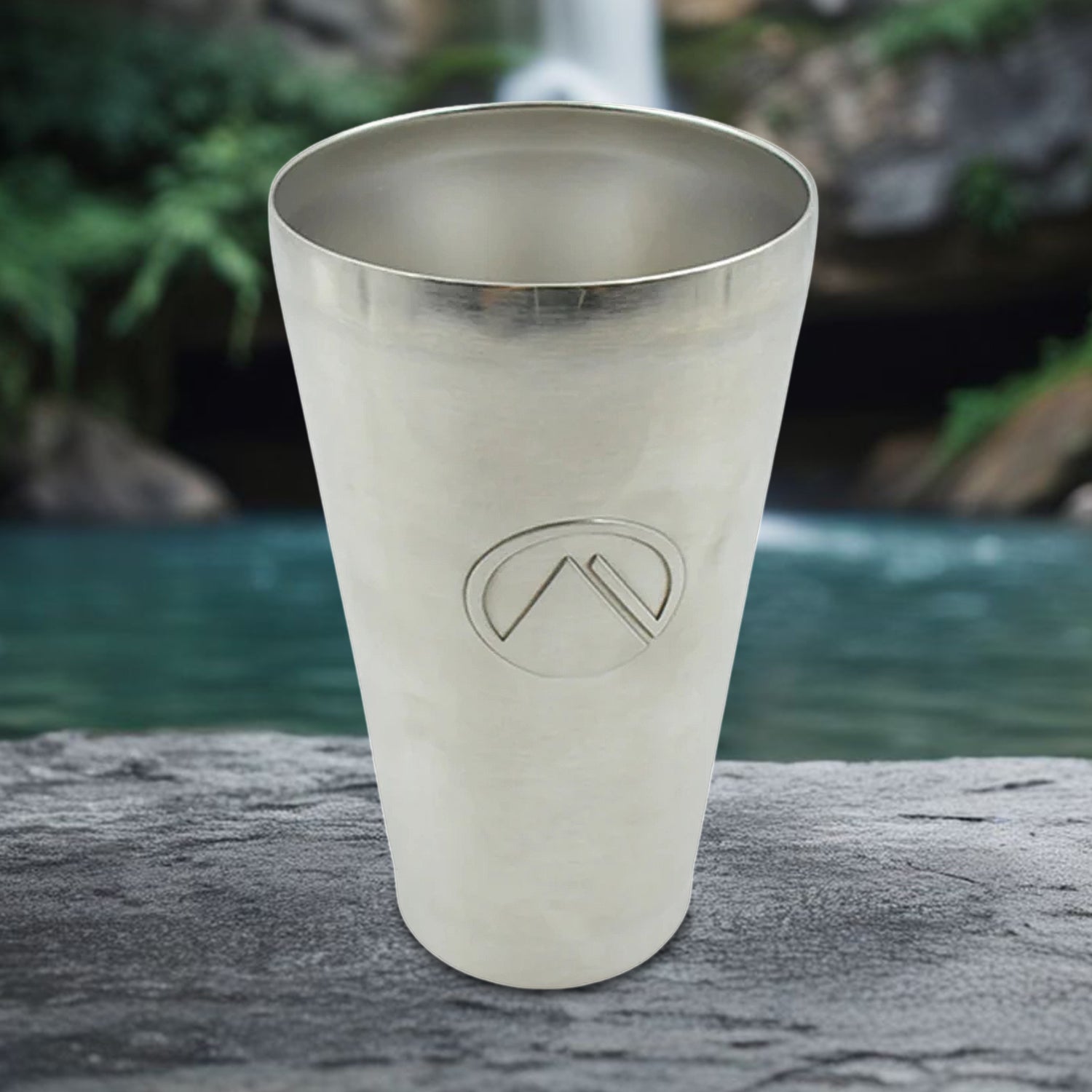 Front view of a sleek stainless steel travel mug, perfect for on-the-go hydration.