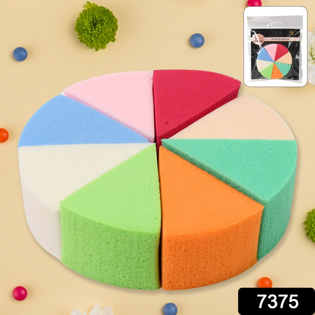 Close-up of a multi-coloured triangle makeup sponge, ready for cosmetic application.