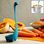 Silicone soup spoon with long handle, ideal for stirring and serving hot dishes.