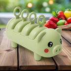 An overhead shot of the Indo Glow Pig Shape Ice Mold, showcasing its BPA-free plastic design.