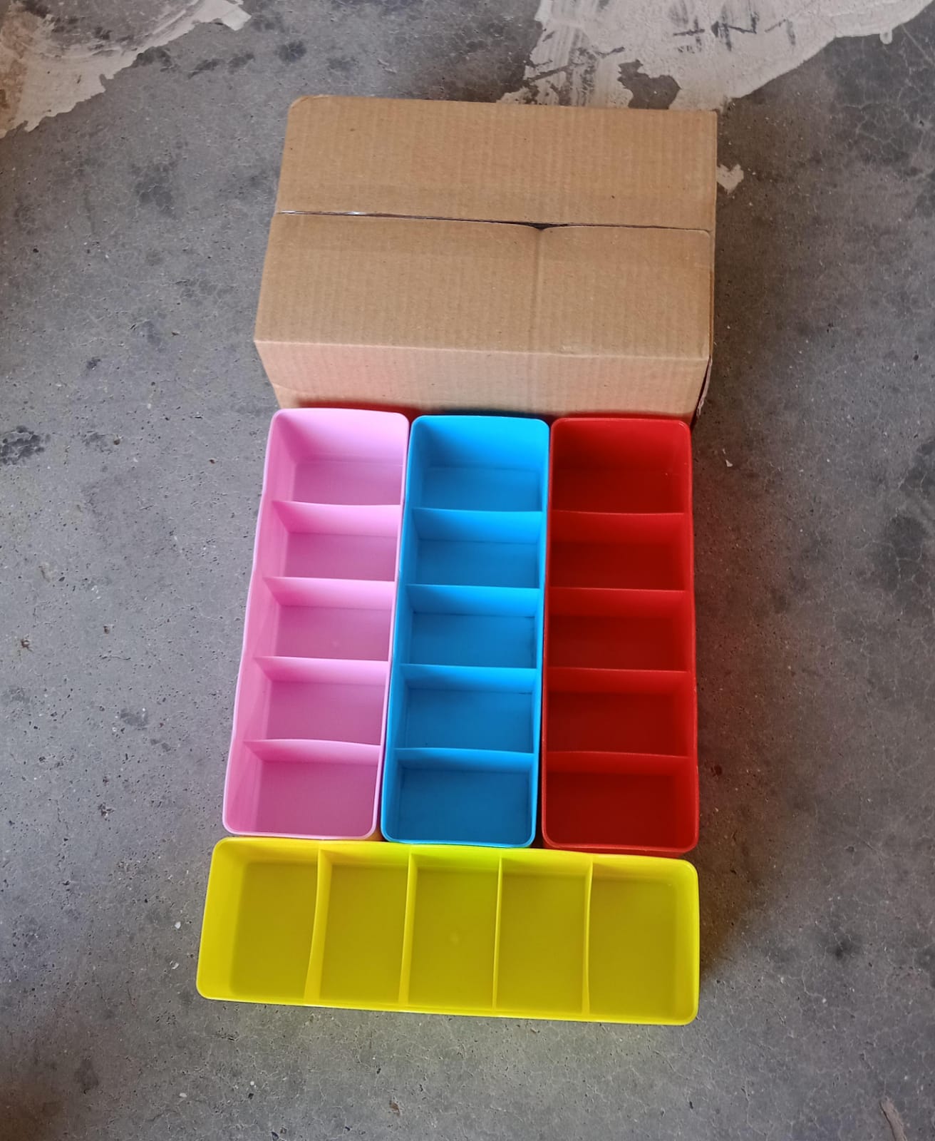 Full view of the Organivo 4-piece desktop drawer organizer set with five compartments for versatile use.