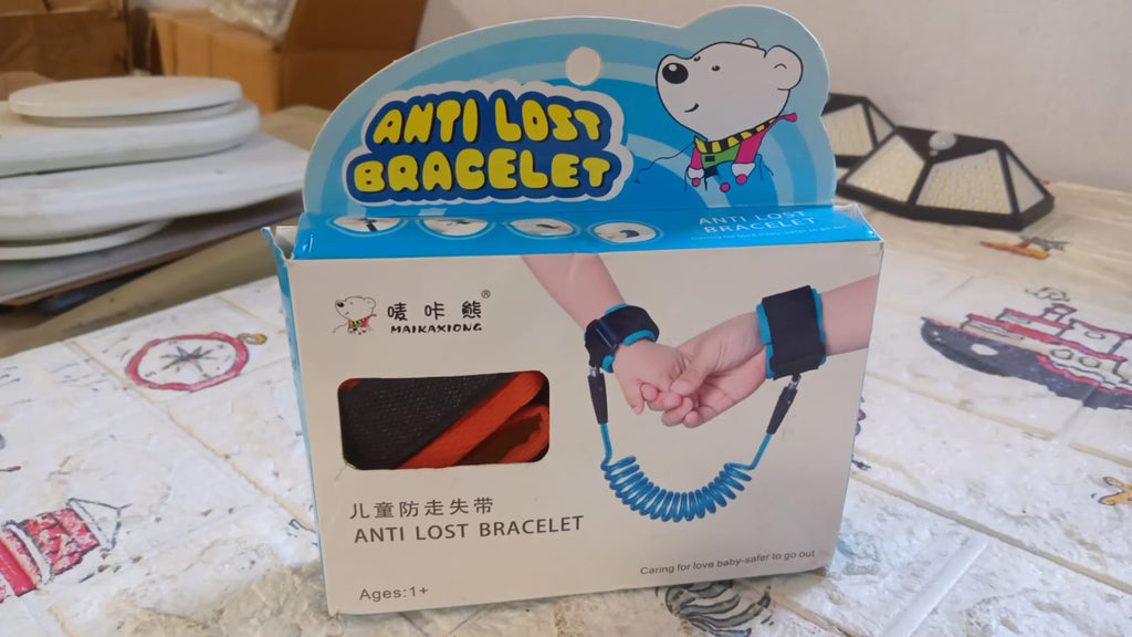 Packaging of the Mini Safy Baby Safety Harness, highlighting its key features.