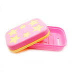 Star-shaped soap case holder in a modern bathroom setting.
