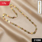 Close-up of multicolor accent beads on traditional gold tone necklace