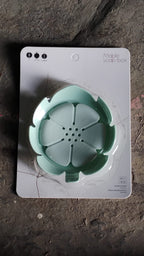 Back view of the plastic soap dish showing its draining holes.