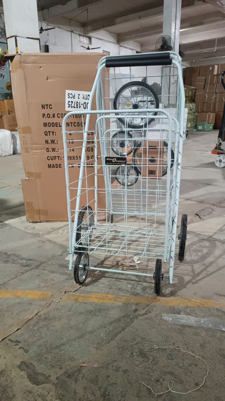 Foldable shopping cart folded compactly for storage