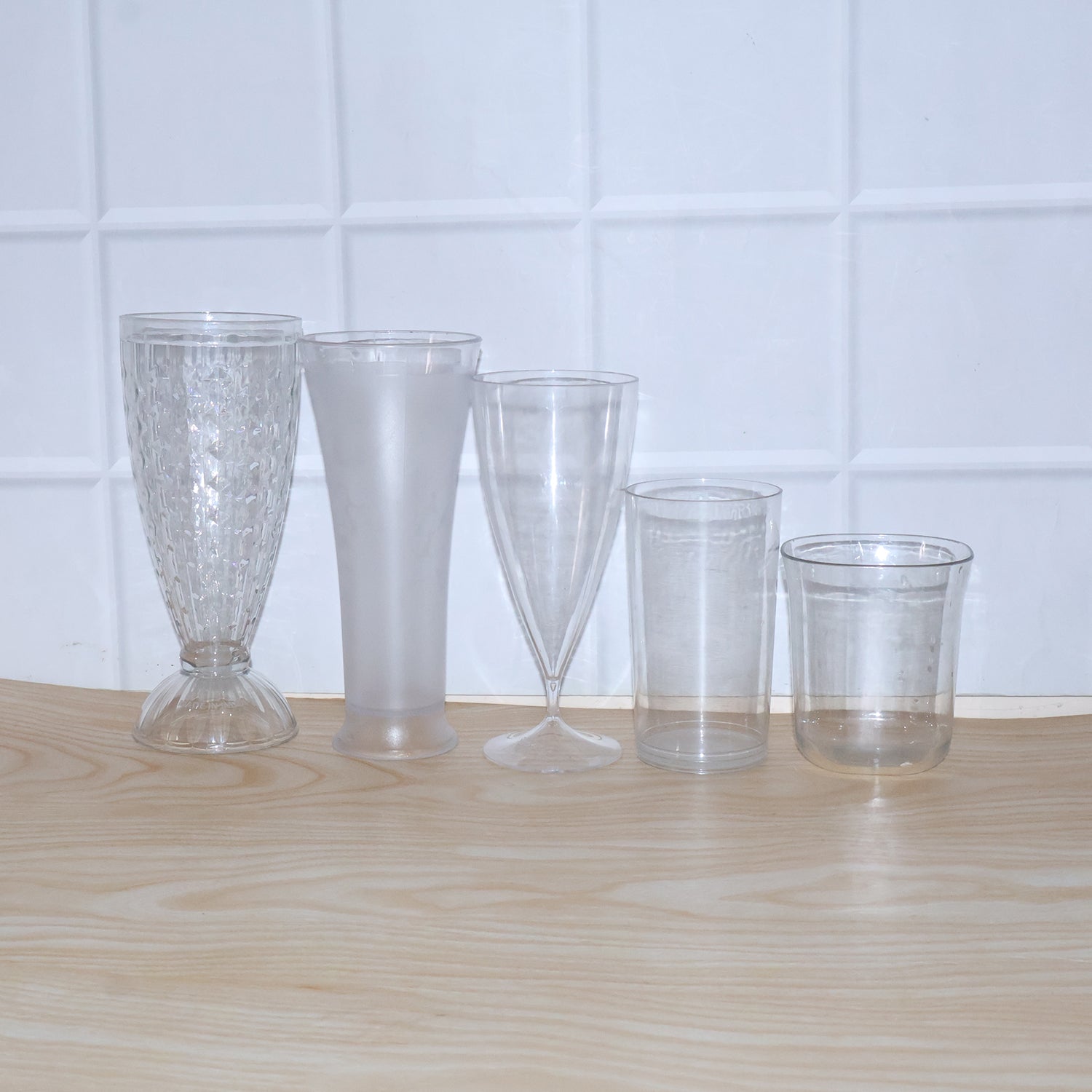 Various angles of stylish unbreakable plastic glass set