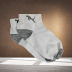 A single pair of colourful printed socks for women, laid flat on a white surface.
