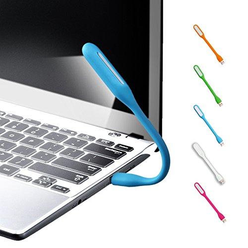 USB LED Light Lamp with a book, highlighting its use for reading.