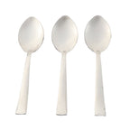 Three stainless steel dining spoons arranged side by side for tableware