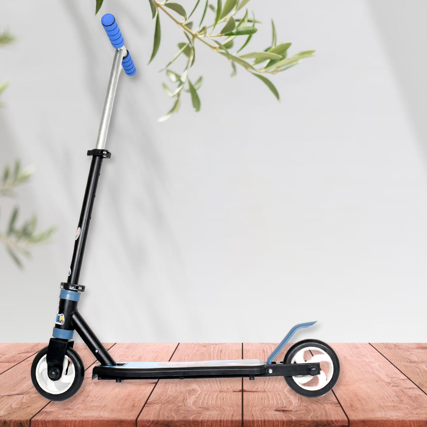 Close-up of comfortable foam grip handlebars and brake on a child's scooter.