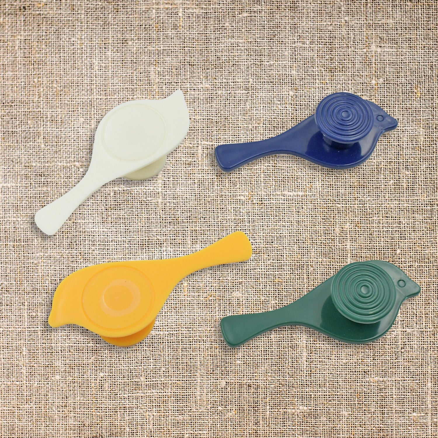 Detailed view of the strong adhesive backing on the versatile bird wall hooks.