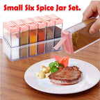 Complete set of six plastic spice jars in assorted vibrant colors.