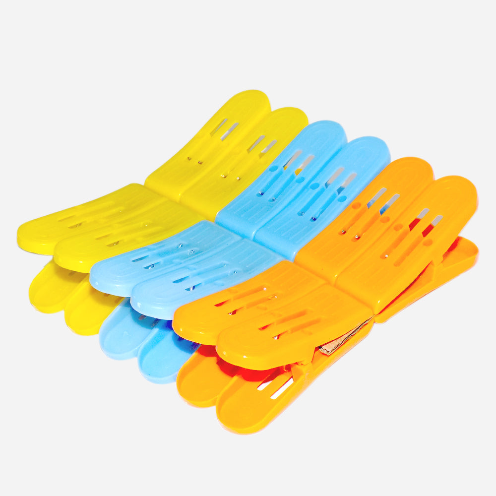 Multicolour plastic double pin cloth drying clips with strong grip for laundry.