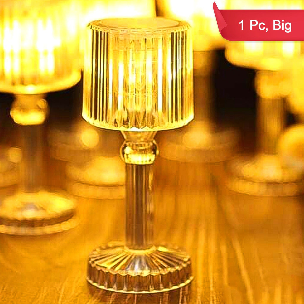 Stylish LED desk lamp casting a warm glow on a bedside table.