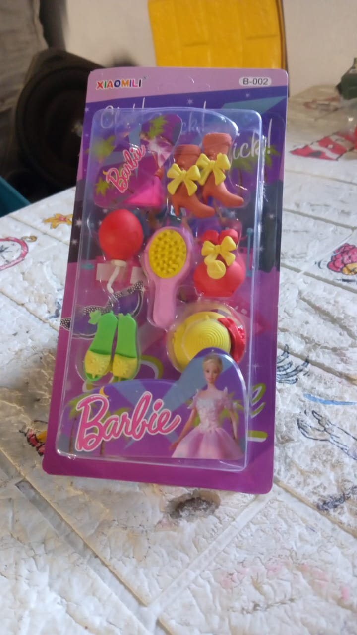 Overhead view of a diverse collection of Mini Erasers for Kids on a clean background.