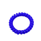 A single blue elastic telephone wire hair tie with its signature coil shape.
