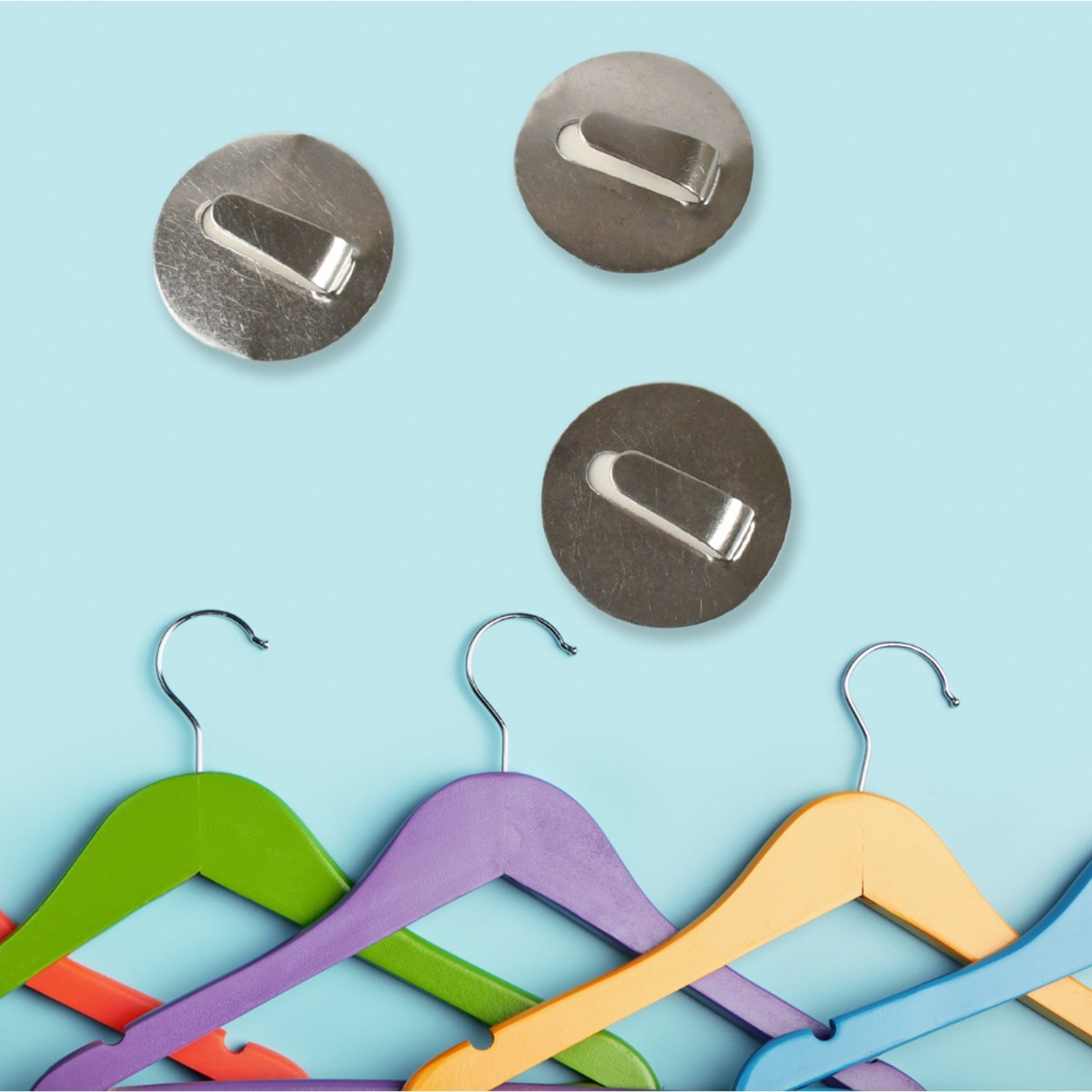 Diagram illustrating simple peel-and-stick installation steps for the sticky hooks.