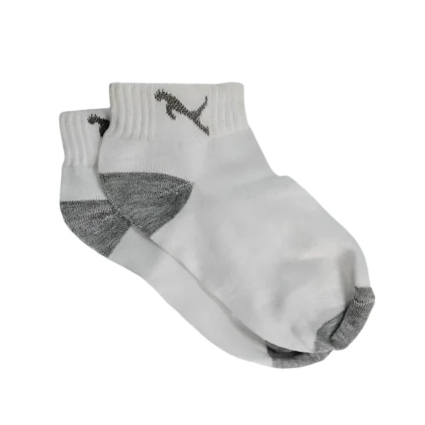 Close-up of a model's feet wearing comfortable, colourful printed socks.