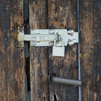 Safelix 60mm solid padlock securing a home door for enhanced security.