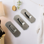 The strong, reusable adhesive backing of a Bathora stainless steel hook for easy installation.