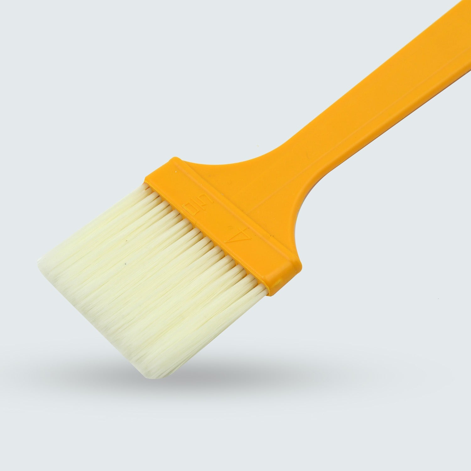 Heat-resistant silicone basting brush for cooking and baking.