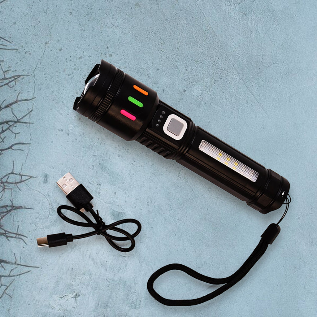 Handheld USB rechargeable LED flashlight in use for outdoor lighting