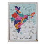 Angled view of the brightly colored wooden India map puzzle for young learners.