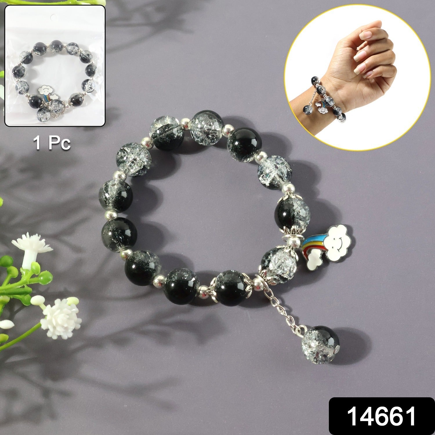 Close-up of glossy black and crackled crystal beads on bracelet
