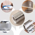 Aluminium foil paper sticker roll being unrolled for application.