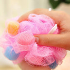 White round bath loofah ready for a refreshing bath or shower.