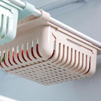 View of a fridge interior with organizers maximizing every inch of storage.