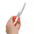 Diagram highlighting the multiple uses of the kitchen scissors, including bottle opener and fish scaler.