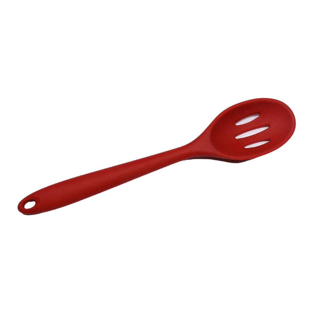 Silicone cooking turner protecting non-stick frying pans from scratches and damage.