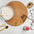 Set of four plastic cookie cutters in heart, star, round, and flower shapes.